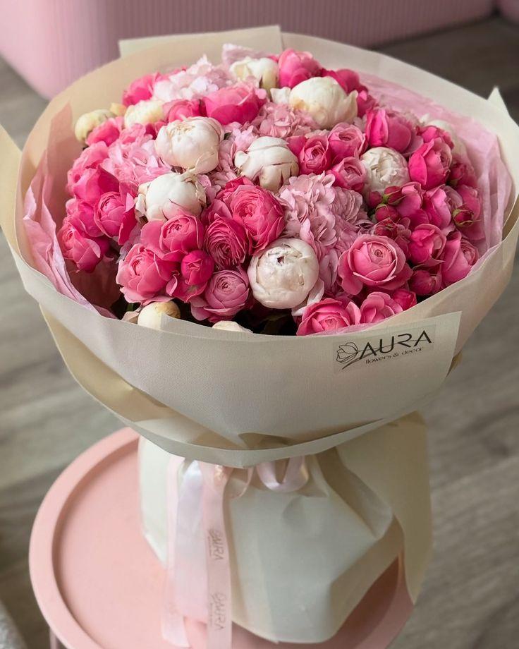 Professional floral arrangement in modern corporate setting